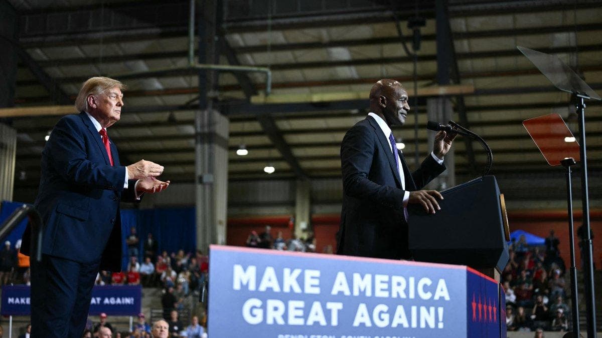 Donald Trump junto a Evander Holyfield/ Kent NISHIMURA